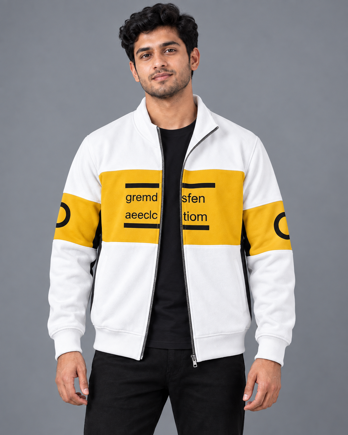 White and mustard yellow colourblock fleece jacket, black styling T-shirt, grey studio background